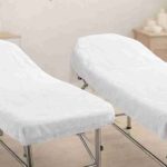 Fundas camilla estética profesional: textiles avanzados para centros de belleza